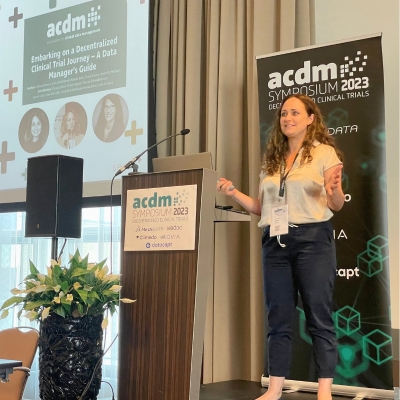 Lauren Alani at ACDM Symposium 2023, presenting on decentralized clinical trials